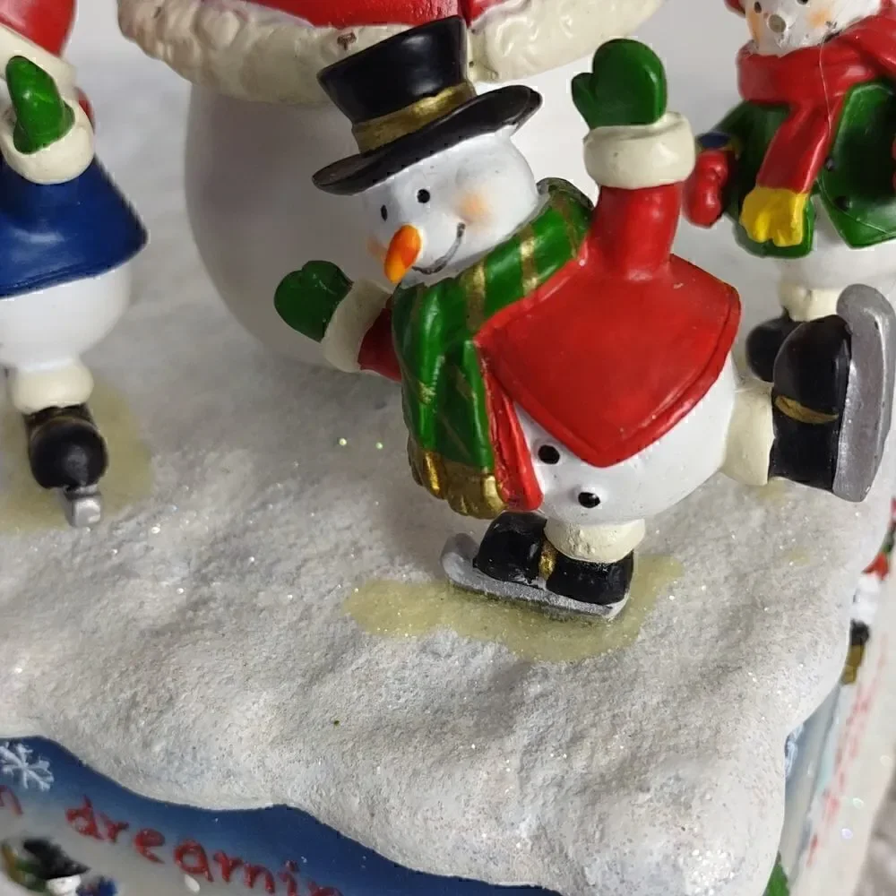 Musical Snowman Family Spinning Figurine